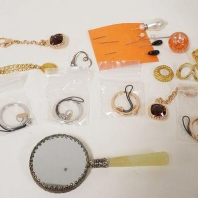 1126	MISC. LOT INCLUDING COSTUME JEWELRY, A BELL TELEPHONE NEW JERSEY GOLD FILLED CHAIN, A MAGNIFYING GLASS. ECT
