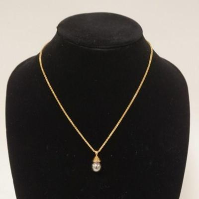 1076	14K YELLOW GOLD CHAIN MARKED 14K FCI W/ A CULTURED TAHITIAN PEARL PENDANT. CHAIN ALONE WEIGHS 4.0 DWT CHAIN W/ PENDANT WEIGHS 7.35 DWT
