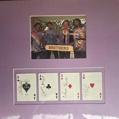 Neville Brothers signed matted collage