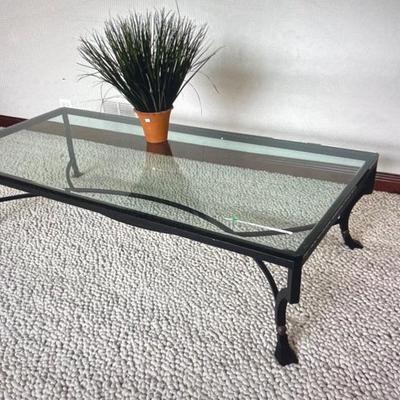 Very large, heavy well made iron base with thick tempered glass.  75L x 35W x 18H has a small chip in glass shown in the last photo $375.00