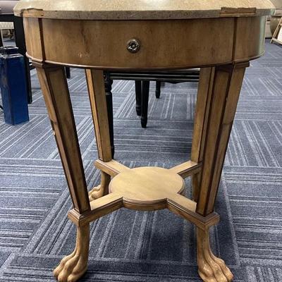 End table 
Some defects, see pictures 
23 in diameter x 26 H
$10.00