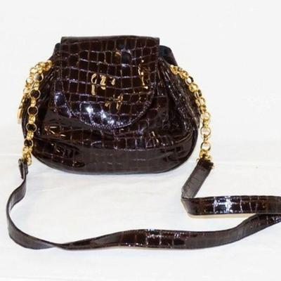 1052	ORIGINAL JAY HERBERT BY SHARIF PATENT ALIGATOR BAG, APPROXIMATELY 9 IN L X 6 IN X H X 3 IN. LOOKS NEW
