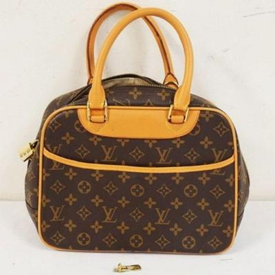 1038	LOUIS VUITTON MARKED BAG, INTERIOR DIRTY, SOME MINOR WEAR. UNKOWN IF AUTHENTIC. APPROXIMATELY 11 IN L X 8 1/2 IN H X 4 1/2 IN,...