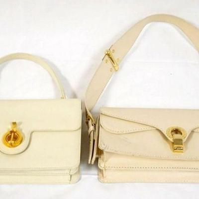 1049	2 CREAM COLOR BAGS, INCLUDING MARC JACOBS HINGED STRAP BAG, SOME MARKINGS ON FRONT OF BAG. MARC JACOBS BAG IS APPROXIMATELY 11 IN L...