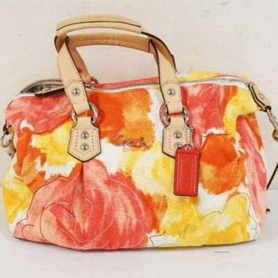 1037	COACH MULTI COLORED BAG, APPROXIMATELY 12 1/2 IN L X 8 1/2 IN H X 4 IN
