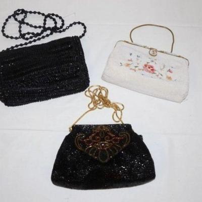 1070	3 VINTAGE BEADED BAGS, WHITE ONE IS BY REAL POINTE BEAVIAS FRANCE, VANESSA OF PARIS NEW YORK LONDON AND BLACK ON IS BY HASHIMOTO...