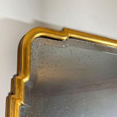 QUEEN ANNE STYLE GILT MIRROR  |  Gilt mirror, the top section with a stepped frame, designed as two beveled glass mirror pieces - w. 24.5...