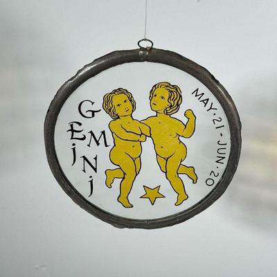 GEMINI SUN CATCHER  |  Stained glass Gemini window hanging showing twins over a star, handmade - dia. 6 in.