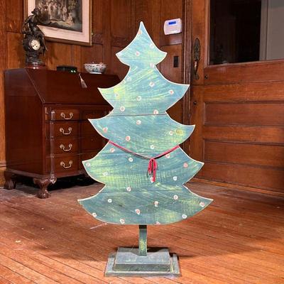 PAINTED WOOD CHRISTMAS TREE  |  Signed on the back, "Sun Garden" - w. 26.5 x h. 47.5 in.
