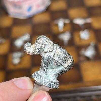 (12pc) REED & BARTON ANIMAL PARADE  |  Cast metal animal figures with openings for holding candles - h. 2.5 in. (tallest)