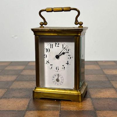 DUVERDREY & BLOQUEL CARRIAGE CLOCK  |  French carriage clock of small size with a brass case, 2 adjustments, the back plate with engraved...