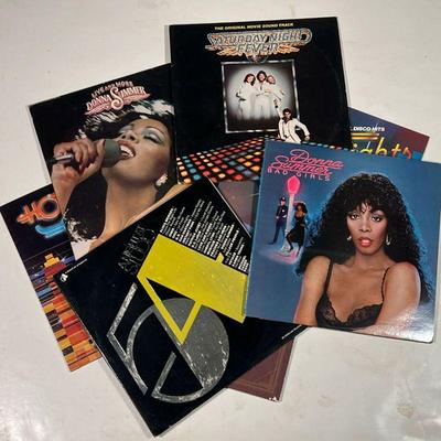 (7pc) DISCO ALBUMS  |  Collection of disco vinyl record albums, including: Saturday Night Fever; Donna Summer Bad Girls; Hot Nights &...