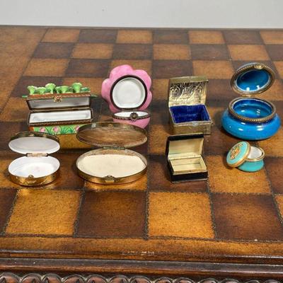 (8pc) LIMOGES BOXES  |  Small Limoges pill / trinket boxes, many with porcelain, one with needlepoint, and one of metal, possibly silver

