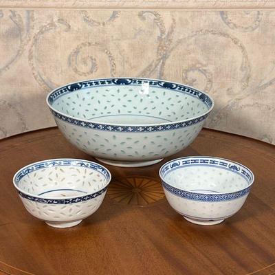 (3pc) CHINESE BOWLS  |  Blue and white decorated bowls with pass-through decorations around the body, including two of similar small size...