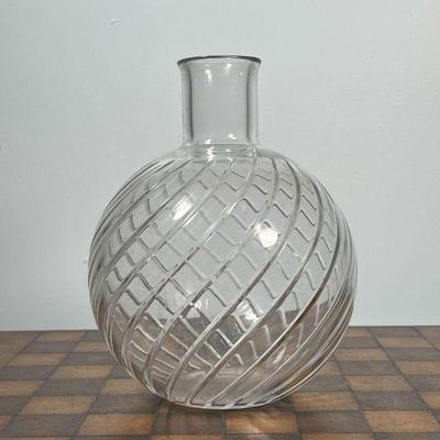 BACCARAT VASE  |  Crystal glass vase of bulbous form with smooth cut ribbed swirls, signed on the bottom - h. 9.5 x dia. 7 in.