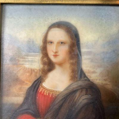 ENAMEL PORTRAIT IN GOLD FRAME  |  Of small size, a reproduction of the Mona Lisa painted on enamel in an antique possibly gold or...