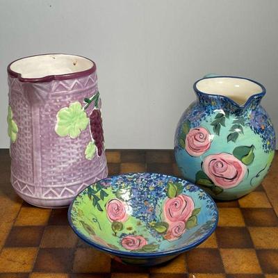(3pc) FLORAL CERAMIC PITCHERS & BOWL  |  Two ceramic pitchers, one with sculpted grape design and signed "Fioriware," and a...