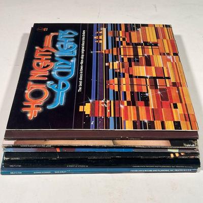 (7pc) DISCO ALBUMS  |  Collection of disco vinyl record albums, including: Saturday Night Fever; Donna Summer Bad Girls; Hot Nights &...