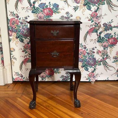 ANTIQUE STYLE BEDSIDE TABLE  |  Nightstand of dark wood, having a shaped top over a single drawer over a cabinet door, all over cabriole...