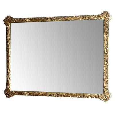 GILT CARVED WALL MIRROR  |  With nice floral and leafy carvings all around - w. 45.5 x h. 35.5 in.