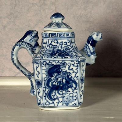 (2pc) BLUE & WHITE PORCELAIN  |  Including a Chinese tea pot of small size with figural spout and handle, with blue seal mark on the...