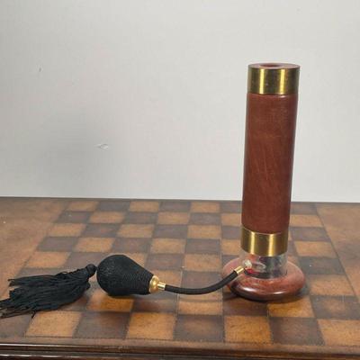 PARETTI FEATHER & LEATHER VINTAGE KALEIDOSCOPE   |  Discontinued vintage kaleidoscope, brown leather body, signed on the glass - h. 9.5 x...