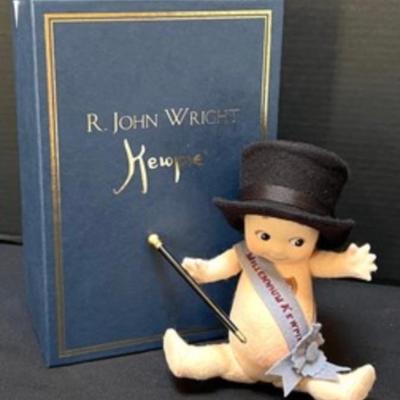 R. John Wright Millennium Kewpie Doll with box and certificate

Number 97/500

Name: Millennium Kewpie Doll 

Description: 7
