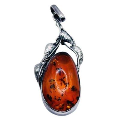 Lot 013
Baltic Amber and Sterling Set Pendant