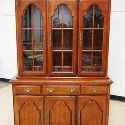 1213	AMERICAN DREW 2 PIECE CHERRY FINISH HUTCH, INTERIOR TOP LIT, 3 DRAWERS OVER 3 DOORS AT BASE, APPROXIMATELY 51 IN X 19 IN X 80 IN H
