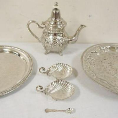 1097	LOT OF ASSORTED SILVERPLATE INCLUDING SERVING TRAYS, TEAPOT & 2 SHELLS W/HANDLES
