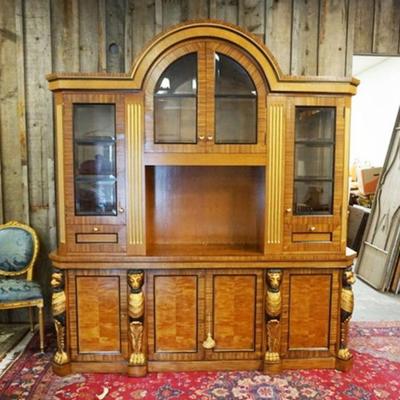 1260	NEO CLASSIC 2 PART BREAKFRONT WITH REEDED COLUMN TOP AND CARVED GILT LIONS ON BASE, BEVELED GLASS DOORS, APPROXIMATELY 85 IN X 19 IN...