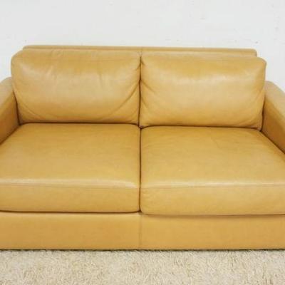 1249	DESIGN WITHIN REACH AMERICAN LEATHER LOVE SEAT, SCRATCHES TO TOP, BACK AND SIDES, APPROXIMATELY 66 IN X 37 IN X 29 IN H
