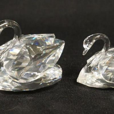 1006	SWAROVSKI CRYSTAL FIGURINES, PAIR OF FEATHERED SWANS, LARGEST APPROXIMATELY 2 1/4 IN H
