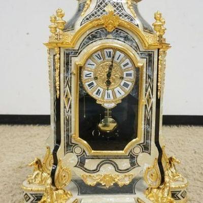 1070	LE ORE ITALIAM SHELF CLOCK WITH GILT METAL HORSES AND TRIM. CLOCK CASE IN MOTHER OF PEARL FINISH, APPROXIMATELY 11 IN X 26 IN X 40...