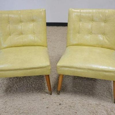 1228	PAIR OF MID CENTURY MODERN TUFTED VINYL SIDE CHAIRS, APPROXIMATELY 23 IN X 23 IN X 31 IN H
