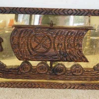 1253	LARGE FRAMED WOOD VIKING SHIP ON BRASS BACKDROP, APPROXIMATELY 64 IN X 34 IN
