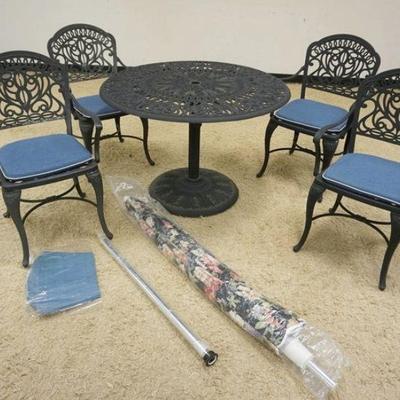 1226	ORNATE CAST METAL PATIO SET, APPROXIMATELY 42 IN X 29 IN ROUND PEDESTAL TABLE WITH UMBRELLA AND 4 ARM CHAIRS
