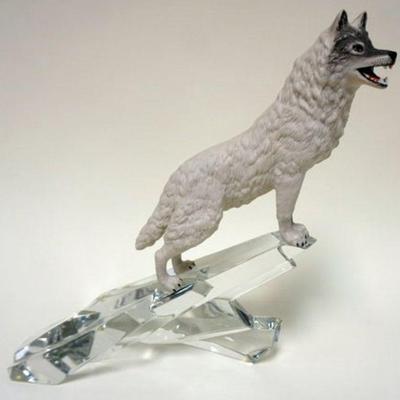 1042	PORCELAIN FIGURE OF WOLF ON GLASS ICE SCULPTURE, APPROXIMATELY 12 IN X 11 3/4 IN H
