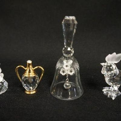 1010	SWAROVSKI CUT CRYSTAL GROUP OF MINIATURES, INCLUDING ROOSTER, POODLE ON BALL AND BELL, LARGEST APPROXIMATELY 3 3/4 IN H
