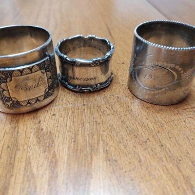 Assortment of silver and silverplate napkin rings. Prices will vary