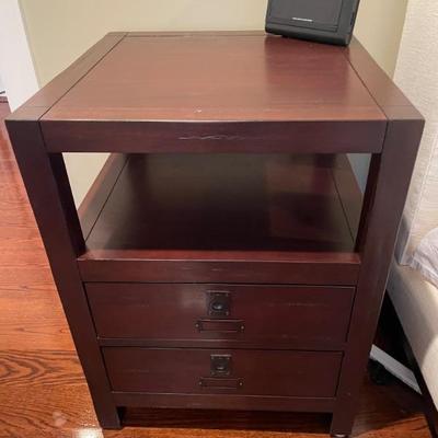 Pottery Barn side tables from the Rhys Collection.  Very sturdy, constructed from a dark-finish tropical hardwood. Two large drawers with...