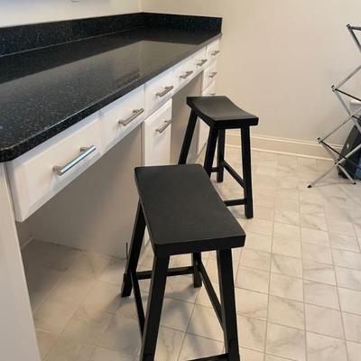 Two black saddle seat count stools available.  (24