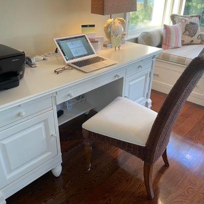 Create a chic home office or the perfect study space with this White Office Desk from Stanley. (24" D x 68" W x 30.5" H) 