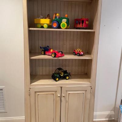 Saybrook Home Whitewashed Storage Bookshelf. This versatile piece offers storage for games, toys and more while providing ample space to...