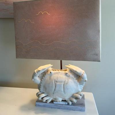 Ceramic Crab Table Lamp on wood base with cut out seascape shade. Base:  11â€ W x 5â€ D
Lamp: 22â€ H 
Shade:  16â€ W x 7.5â€ D x...