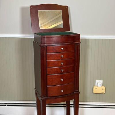 JEWELRY CHEST  |  
Tall standing jewelry chest with 6 drawers and lift top mirrored lid, also with jewelry storage on the sides - l. 11...