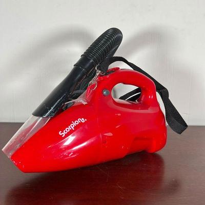 DIRT DEVIL VACUUM  |  
Scorpion handheld vacuum cleaner, model no. 0871