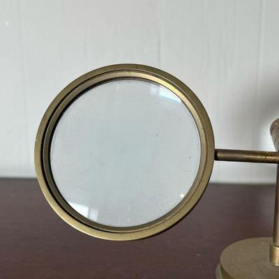 BRASS MAGNIFIER  |  
Magnifying glass on adjustable stand - h. 7 in.