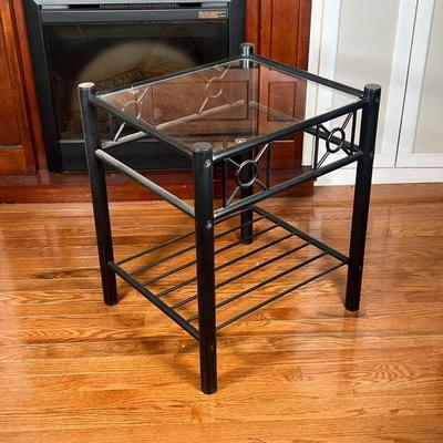 GLASS TOP SIDE TABLE  |
On a black metal frame with lower shelf