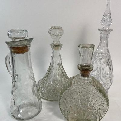 Four Vintage Lead Crystal and Glass Decanters
